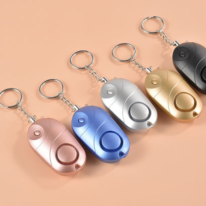 Alarme Personnelle Anti-Agression 130dB – Lampe LED & Défense Individuelle