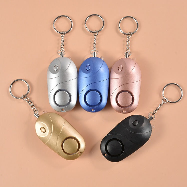 Alarme Personnelle Anti-Agression 130dB – Lampe LED & Défense Individuelle