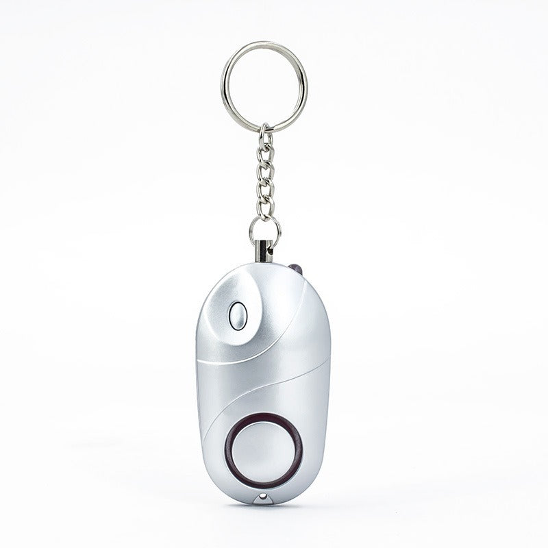 Alarme Personnelle Anti-Agression 130dB – Lampe LED & Défense Individuelle